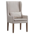 Fauteuil capitonné à oreilles