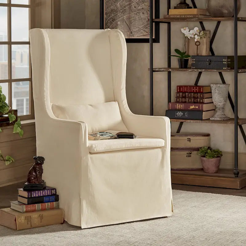 Fauteuil capitonné à oreilles