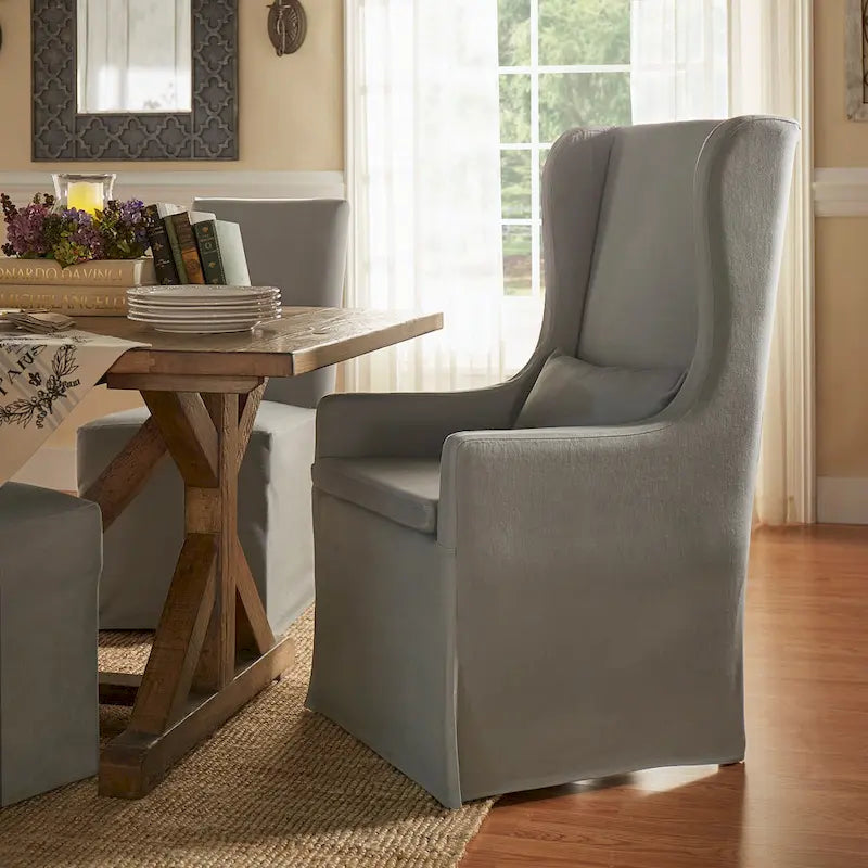 Fauteuil capitonné à oreilles