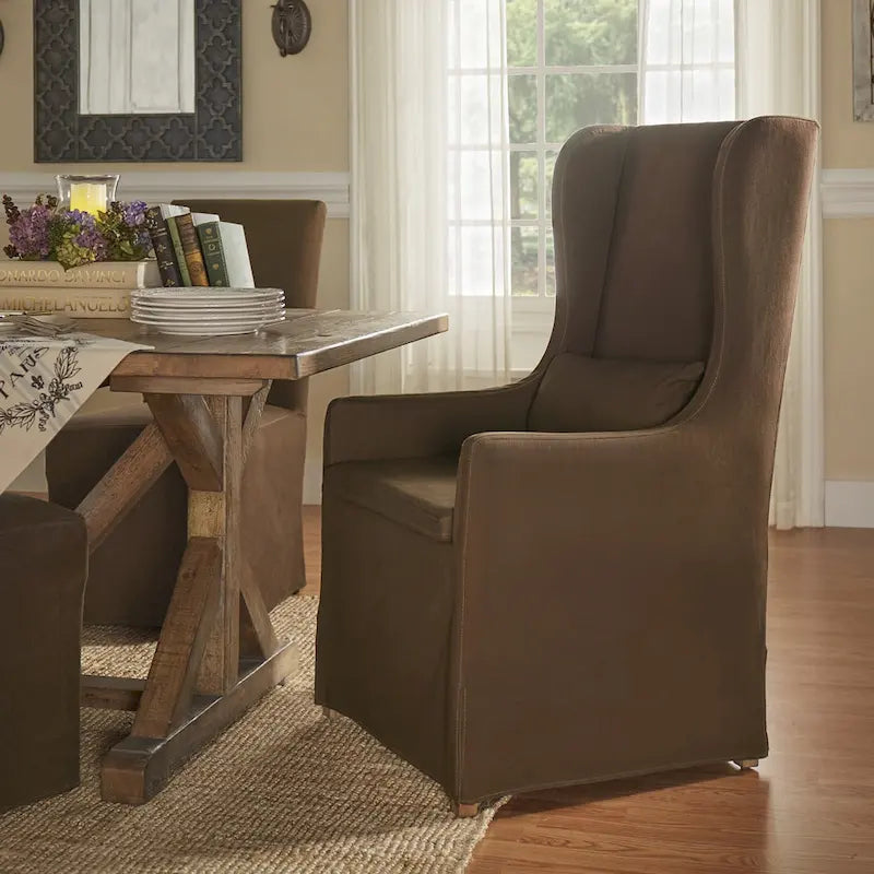 Fauteuil capitonné à oreilles