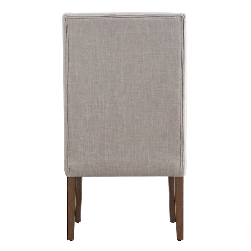 Fauteuil capitonné à oreilles